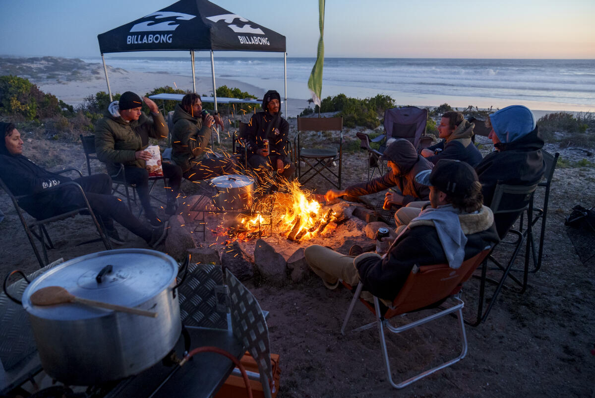 NAMAKWA CHALLENGE, HONDEKLIPBAAI, NORTHERN CAPE, SOUTH AFRICA - AUGUST 24: Camp fire with contestants on August 24th, 2021 Hondeklipbaai, Northern Cape, South Africa. (Photo by Alan van Gysen/World Surf League)