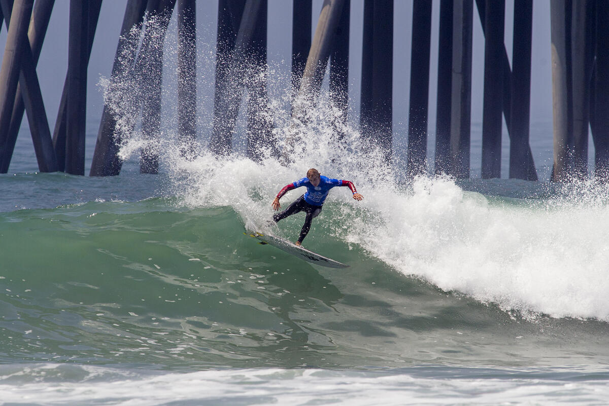 Killian Garland surfing the trials Heat 1 at the Vans US Open of Surfing.
