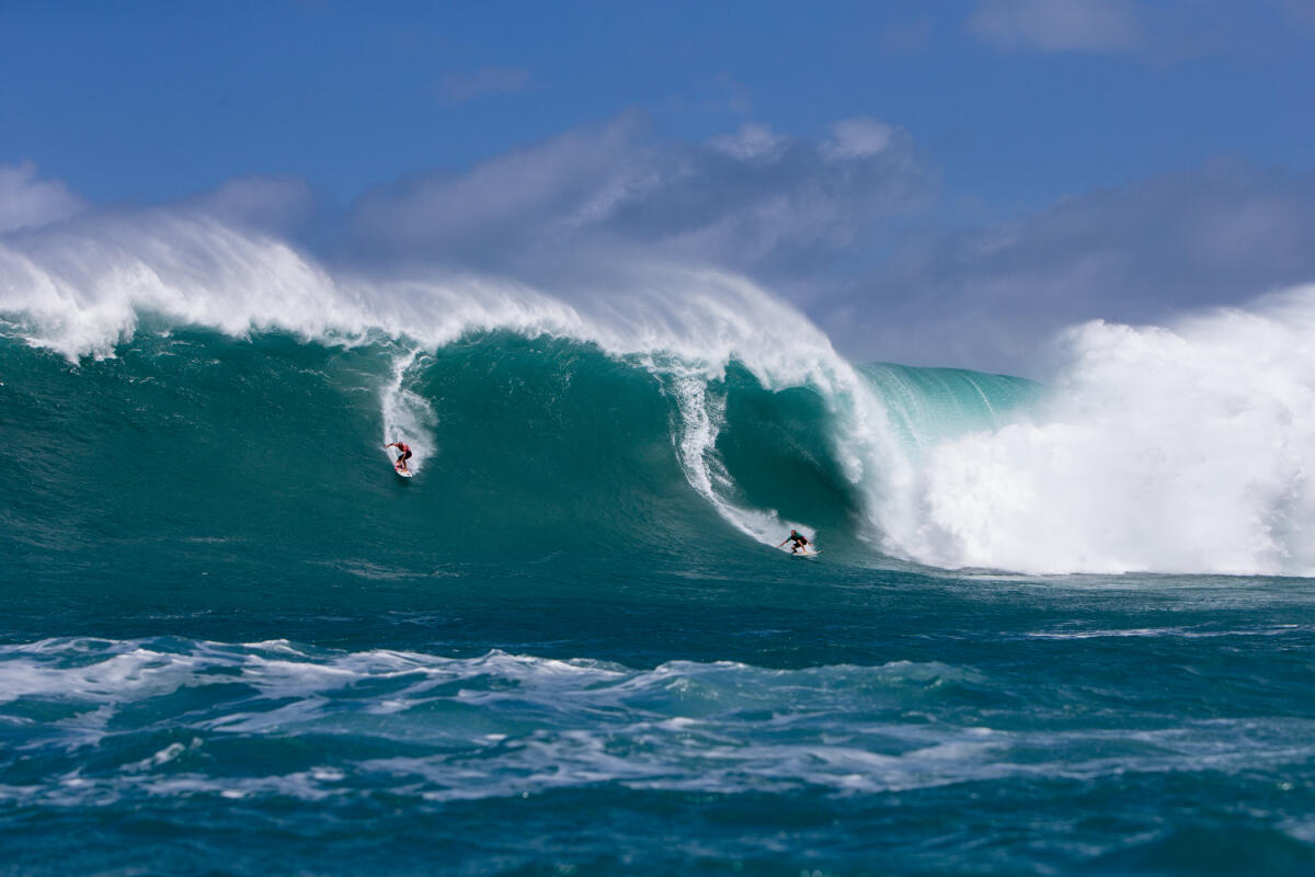 Jamie O'Brien and Shane Dorian share a wave